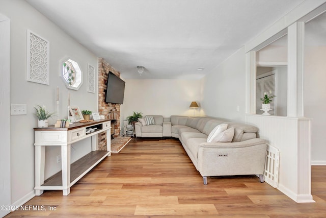 2620 Shenandoah Dr S, Orange Park, FL 32073 - living room featuring light wood finished floors and baseboards