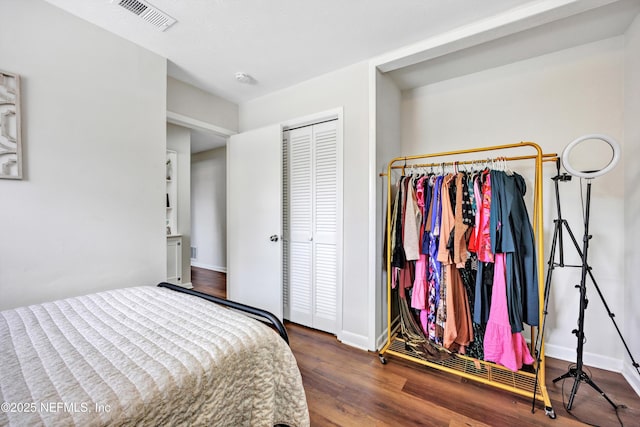 2620 Shenandoah Dr S, Orange Park, FL 32073 - bedroom featuring wood finished floors, baseboards, and a closet