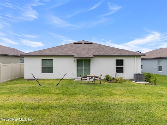 1976 Red Loop, Lakeland, FL 33801 - back of property with central air condition unit, roof with shingles, and stucco siding