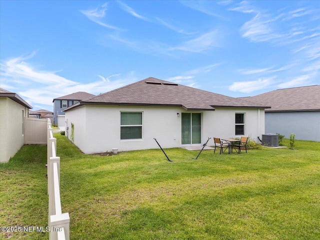 1976 Red Loop, Lakeland, FL 33801 - rear view of house with roof with shingles, stucco siding, and cooling unit