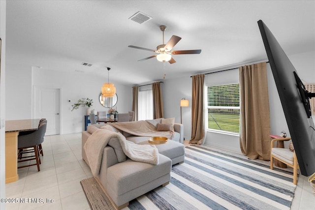 1976 Red Loop, Lakeland, FL 33801 - living area featuring a ceiling fan and light tile patterned floors