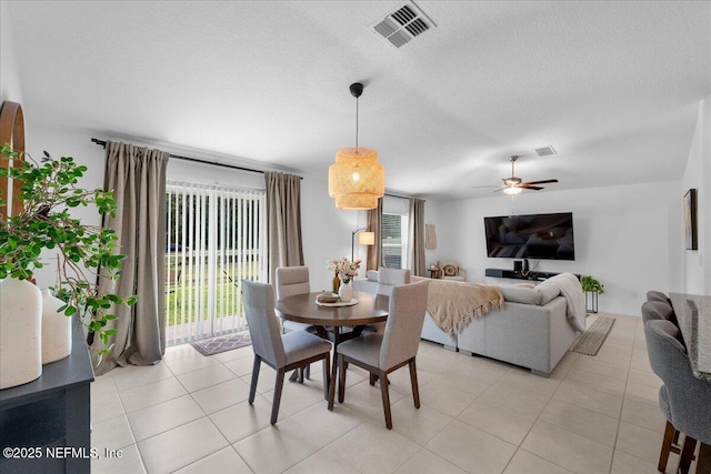 1976 Red Loop, Lakeland, FL 33801 - dining room with light tile patterned floors and a ceiling fan