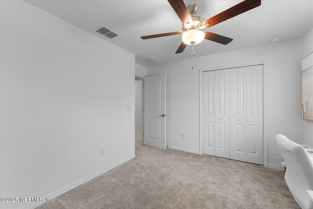 1976 Red Loop, Lakeland, FL 33801 - bedroom with carpet flooring, a closet, baseboards, and ceiling fan
