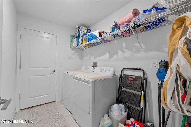 1976 Red Loop, Lakeland, FL 33801 - laundry room with washing machine and dryer and light tile patterned floors