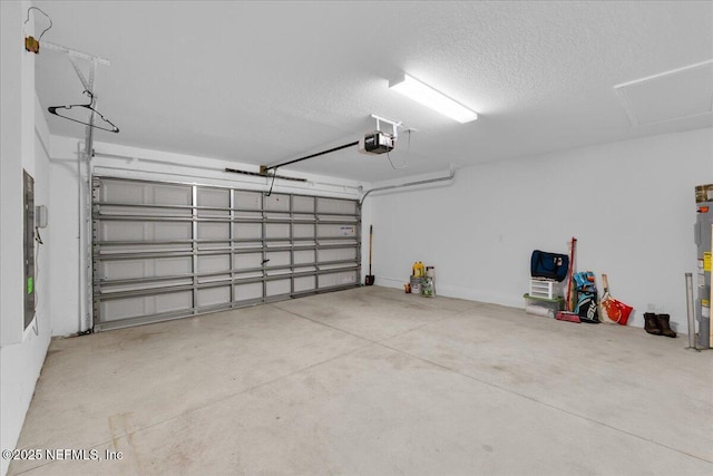 1976 Red Loop, Lakeland, FL 33801 - garage featuring a garage door opener and water heater