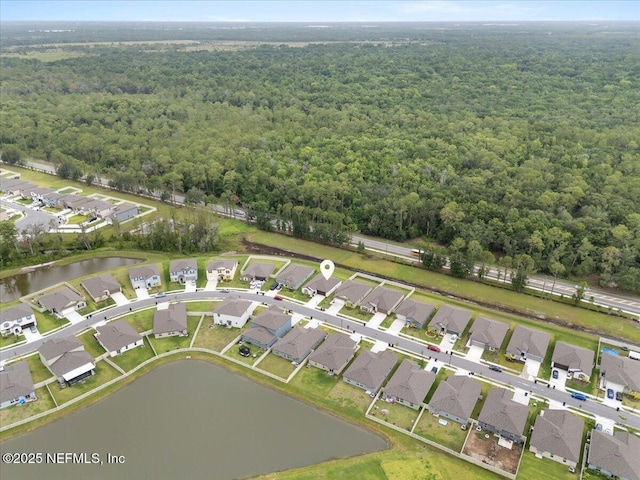 1976 Red Loop, Lakeland, FL 33801 - view of property location featuring a forest, a large body of water, and nearby suburban area