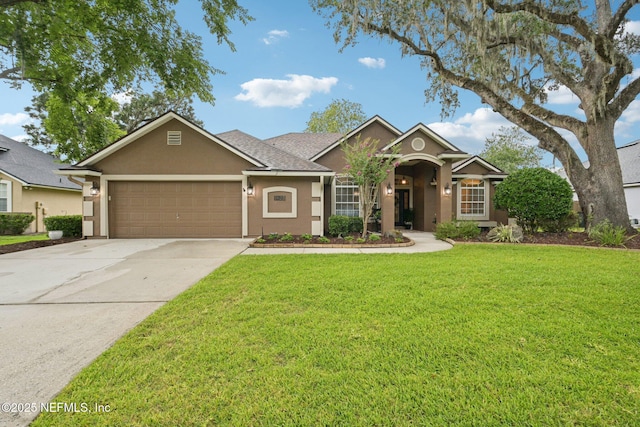 1823 Sentry Oak Ct, Fleming Island, FL 32003 - ranch-style house featuring stucco siding, concrete driveway, a front yard, and a garage