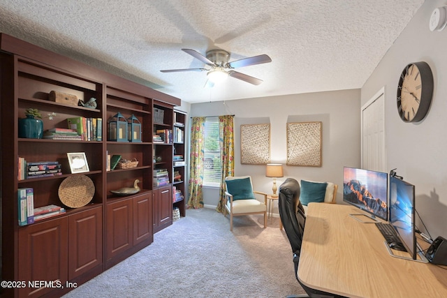 1823 Sentry Oak Ct, Fleming Island, FL 32003 - carpeted home office featuring a ceiling fan, baseboards, and a textured ceiling