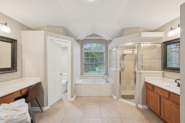 1823 Sentry Oak Ct, Fleming Island, FL 32003 - full bathroom with a bath, a stall shower, vanity, a textured ceiling, and toilet