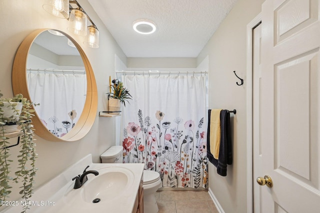 1823 Sentry Oak Ct, Fleming Island, FL 32003 - full bathroom featuring toilet, tile patterned floors, a textured ceiling, vanity, and curtained shower
