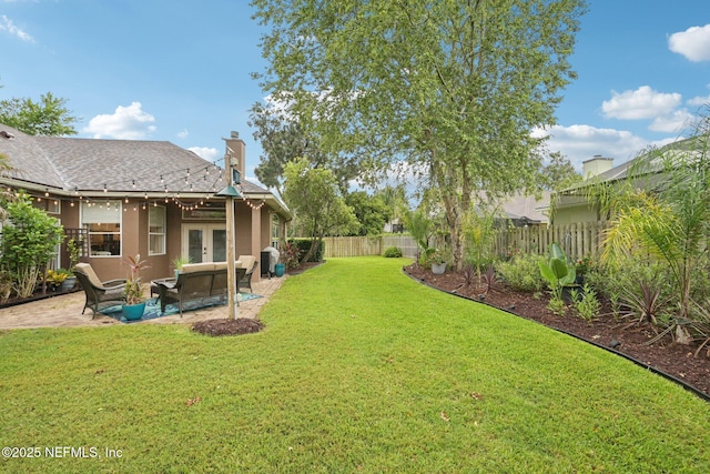 1823 Sentry Oak Ct, Fleming Island, FL 32003 - view of yard with french doors, a patio area, and an outdoor living space