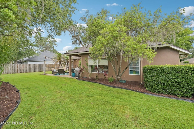 1823 Sentry Oak Ct, Fleming Island, FL 32003 - back of house with stucco siding and a patio