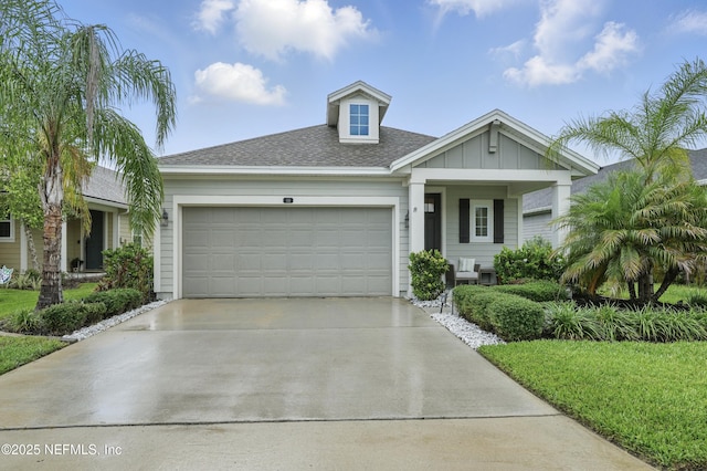 48 Foxcross Ave, Saint Augustine, FL 32092 - ranch-style house featuring a garage, driveway, board and batten siding, roof with shingles, and covered porch