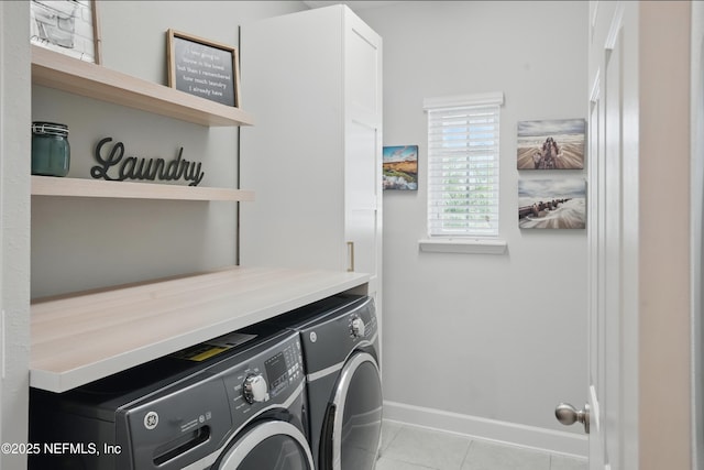 48 Foxcross Ave, Saint Augustine, FL 32092 - laundry room featuring washing machine and dryer, light tile patterned flooring, and baseboards