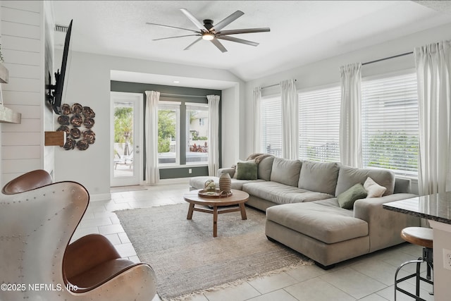 48 Foxcross Ave, Saint Augustine, FL 32092 - living area with light tile patterned floors, ceiling fan, and lofted ceiling