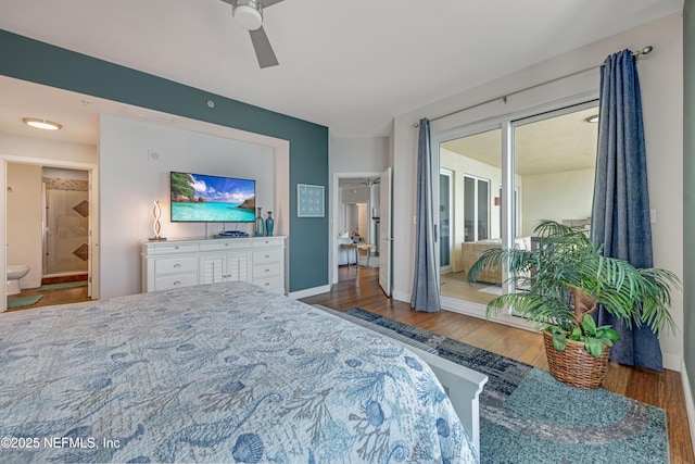 1925 S Atlantic Ave Unit 1005, Daytona Beach Shores, FL 32118 - bedroom with wood finished floors, connected bathroom, baseboards, and a ceiling fan