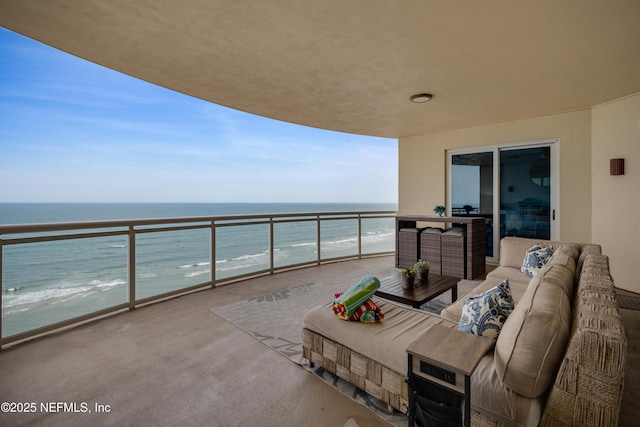 1925 S Atlantic Ave Unit 1005, Daytona Beach Shores, FL 32118 - balcony featuring outdoor lounge area and view of water and beach