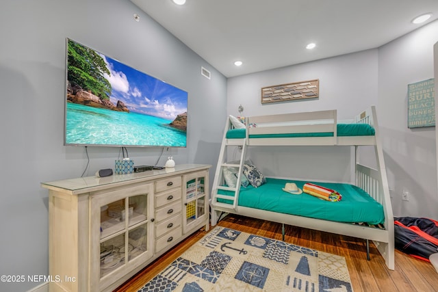 1925 S Atlantic Ave Unit 1005, Daytona Beach Shores, FL 32118 - bedroom with wood finished floors and recessed lighting