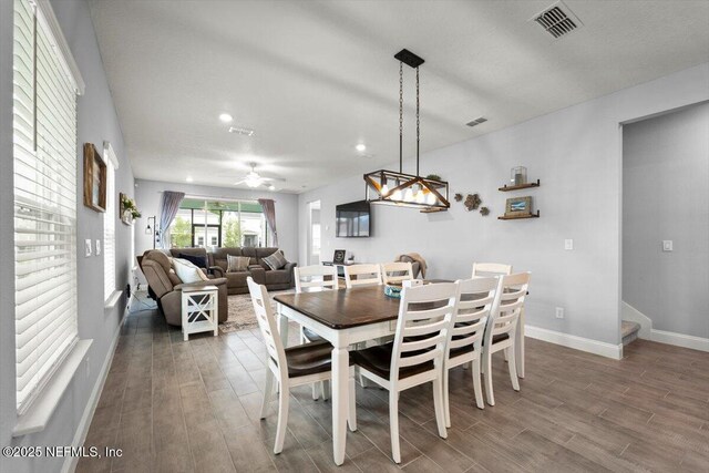 46 Killarney Ave, Saint Johns, FL 32259 - dining space featuring baseboards, wood finished floors, a ceiling fan, recessed lighting, and stairs