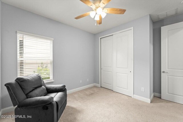 46 Killarney Ave, Saint Johns, FL 32259 - living area featuring light colored carpet, a ceiling fan, and baseboards