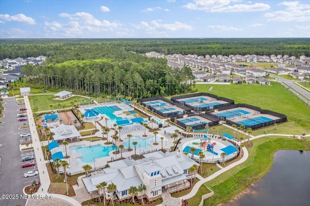 233 Brandon Lakes Dr, Saint Augustine, FL 32092 - aerial view of a forest and a pool area