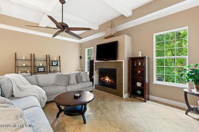 69 Bridle Ridge Ct, Flagler Beach, FL 32136 - living area featuring ceiling fan, plenty of natural light, a fireplace, beam ceiling, and light tile patterned flooring
