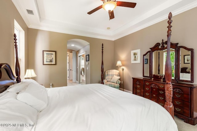 69 Bridle Ridge Ct, Flagler Beach, FL 32136 - bedroom with arched walkways, multiple windows, ceiling fan, and ornamental molding