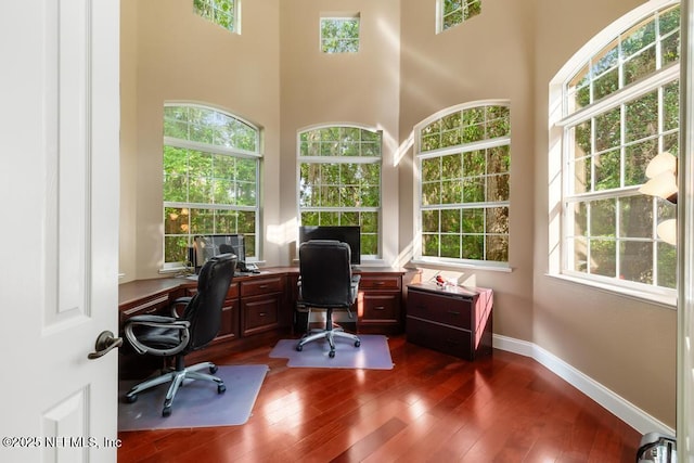 69 Bridle Ridge Ct, Flagler Beach, FL 32136 - office featuring dark wood-style floors and baseboards