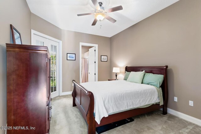 69 Bridle Ridge Ct, Flagler Beach, FL 32136 - bedroom featuring light carpet, baseboards, and access to outside