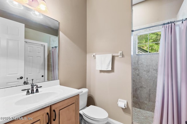 69 Bridle Ridge Ct, Flagler Beach, FL 32136 - bathroom featuring vanity, toilet, and tiled shower