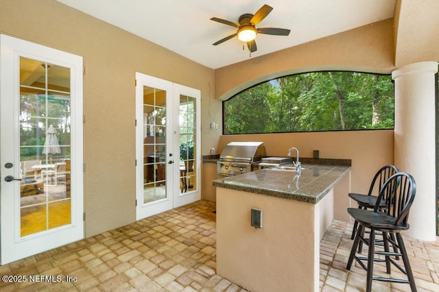 69 Bridle Ridge Ct, Flagler Beach, FL 32136 - view of patio featuring french doors, a sink, and a ceiling fan