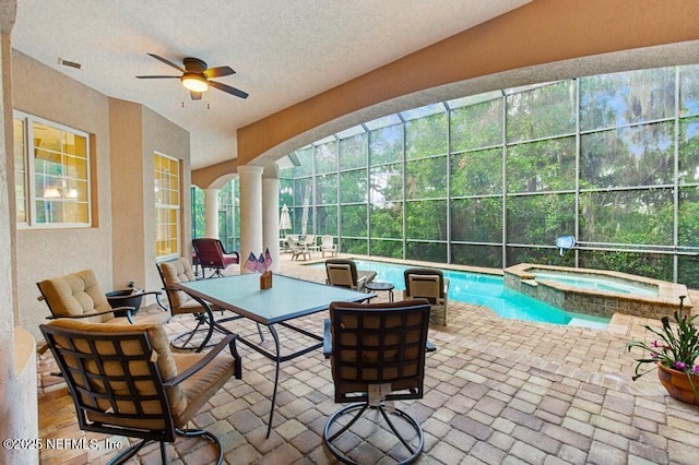 69 Bridle Ridge Ct, Flagler Beach, FL 32136 - sunroom / solarium with a jacuzzi and a swimming pool