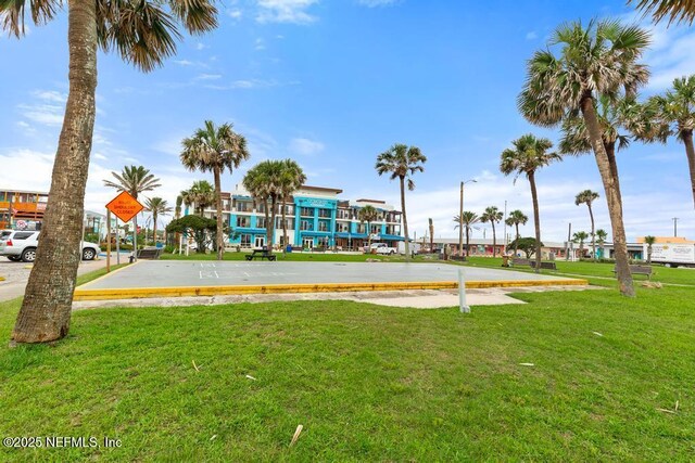69 Bridle Ridge Ct, Flagler Beach, FL 32136 - view of home's community with a lawn