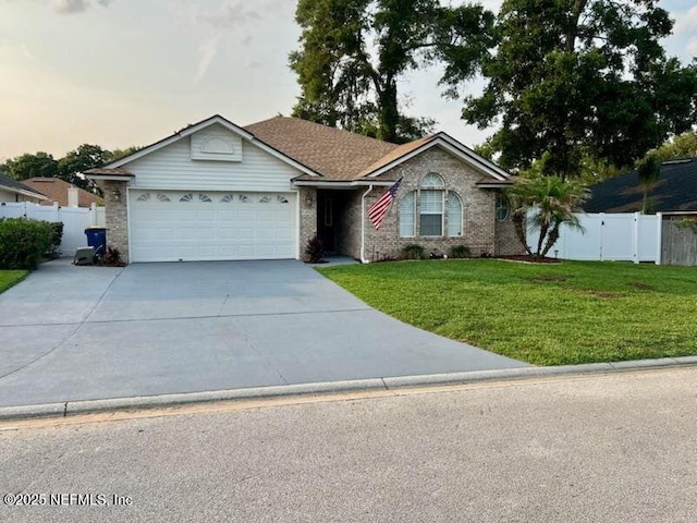 12357 Winterpine Ct, Jacksonville, FL 32225 - single story home with an attached garage, concrete driveway, and brick siding