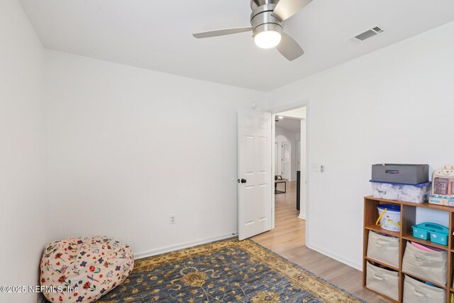 12357 Winterpine Ct, Jacksonville, FL 32225 - sitting room featuring light wood-style flooring, a ceiling fan, and baseboards