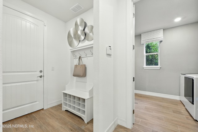 96 Glenhurst Ave, Ponte Vedra, FL 32081 - mudroom featuring washer and clothes dryer, light wood-style floors, and recessed lighting