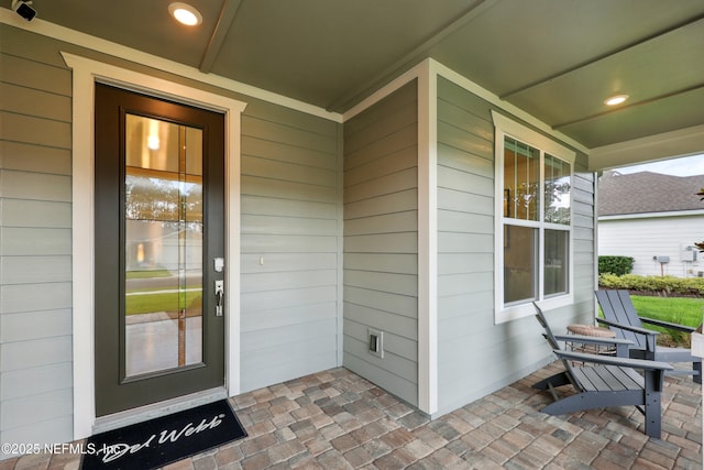 96 Glenhurst Ave, Ponte Vedra, FL 32081 - property entrance with a porch and a surveillance system
