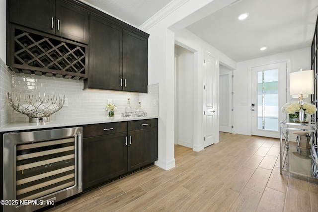 96 Glenhurst Ave, Ponte Vedra, FL 32081 - indoor dry bar featuring wine cooler, backsplash, light wood-style flooring, and recessed lighting