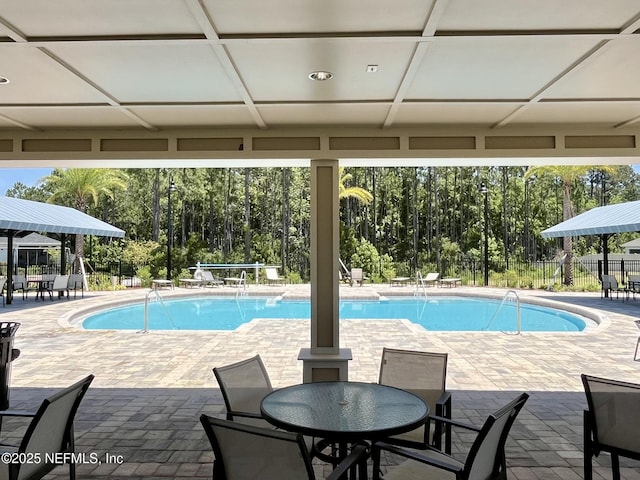354 Boulder Ln, Saint Johns, FL 32259 - community pool with a patio area