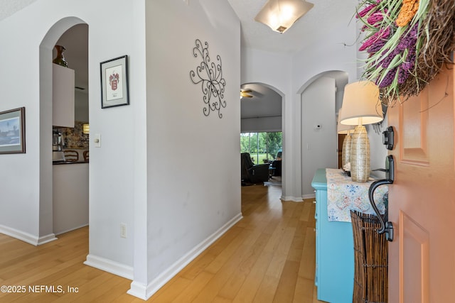 4340 Comanche Trail Blvd, Saint Johns, FL 32259 - entryway with light wood-style floors, arched walkways, and a ceiling fan