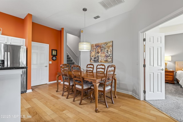 4340 Comanche Trail Blvd, Saint Johns, FL 32259 - dining room with stairway and light wood-style floors