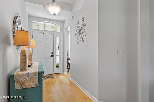 4340 Comanche Trail Blvd, Saint Johns, FL 32259 - entryway featuring arched walkways and light wood-style floors