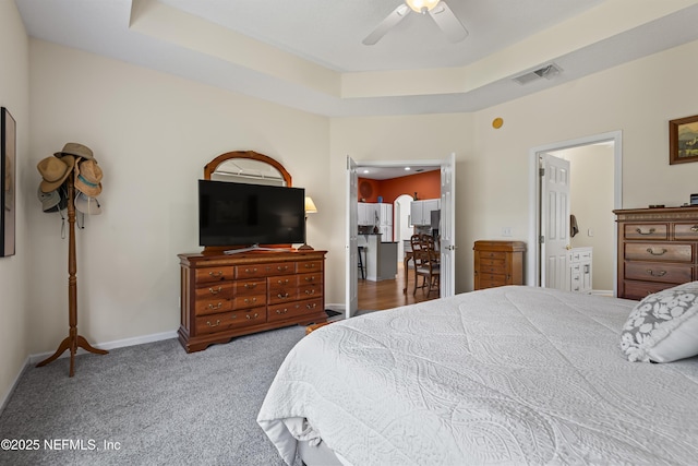 4340 Comanche Trail Blvd, Saint Johns, FL 32259 - bedroom featuring a tray ceiling, carpet floors, a ceiling fan, and ensuite bathroom