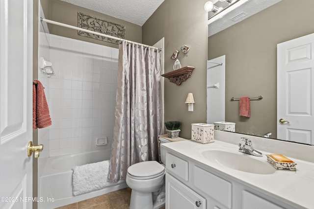 4340 Comanche Trail Blvd, Saint Johns, FL 32259 - bathroom featuring vanity, shower / tub combo with curtain, tile patterned flooring, and a textured ceiling
