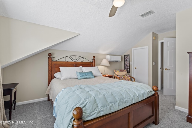 4340 Comanche Trail Blvd, Saint Johns, FL 32259 - bedroom with a wall mounted AC, carpet flooring, a textured ceiling, lofted ceiling, and a ceiling fan