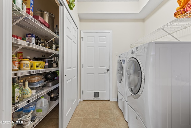 4340 Comanche Trail Blvd, Saint Johns, FL 32259 - washroom with separate washer and dryer and light tile patterned floors