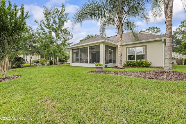 4340 Comanche Trail Blvd, Saint Johns, FL 32259 - rear view of house featuring a sunroom, a yard, and ceiling fan