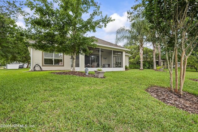 4340 Comanche Trail Blvd, Saint Johns, FL 32259 - back of house with a sunroom and a yard