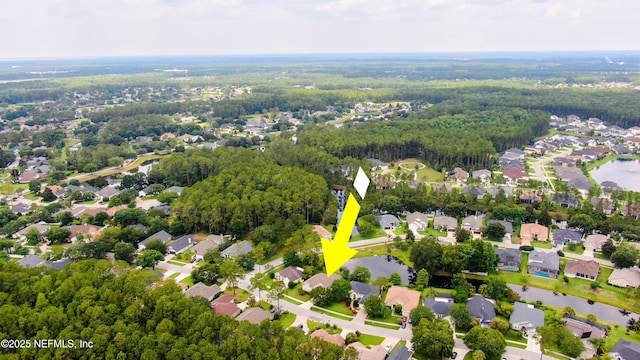 4340 Comanche Trail Blvd, Saint Johns, FL 32259 - aerial perspective of suburban area with a large body of water and a heavily wooded area