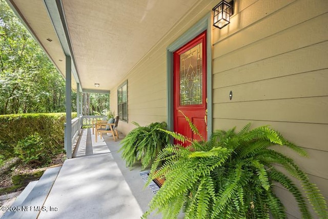 2768 N Periwinkle Ave, Middleburg, FL 32068 - entrance to property with covered porch
